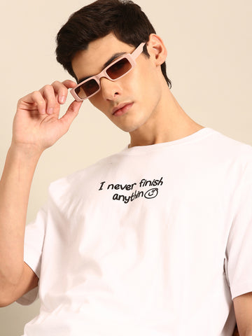 Never Finish Anything: White typography print oversized fit tshirt