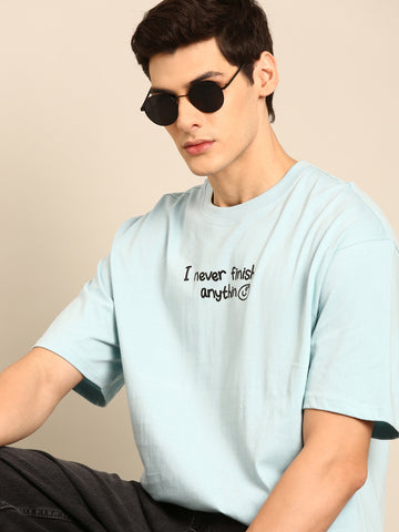 Never Finish Anything: Aqua typography print oversized fit tshirt