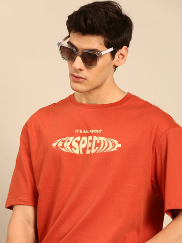 Perspective: Rust typography print oversized fit tshirt