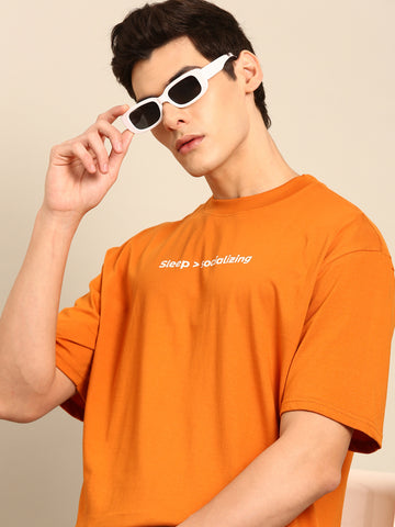 Sleep and Socialising: Orange typography print oversized fit tshirt